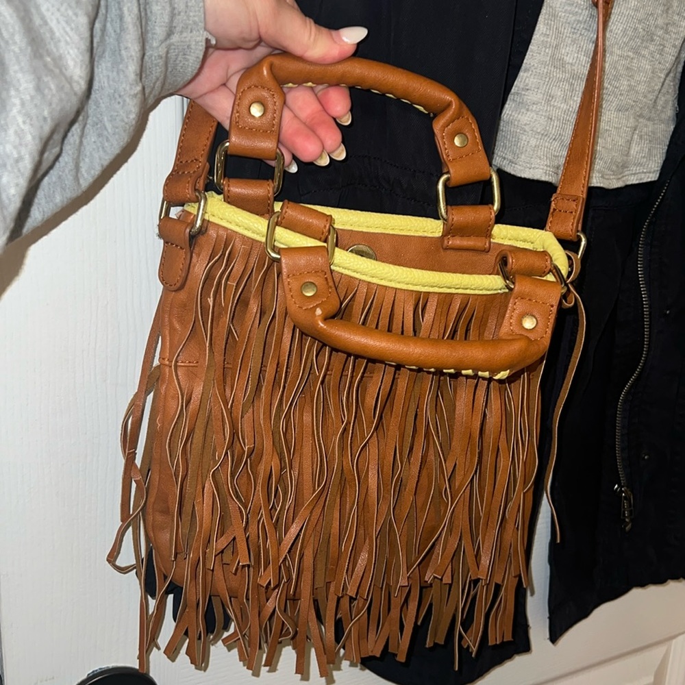 Steve Madden: Fringe tan crossbody